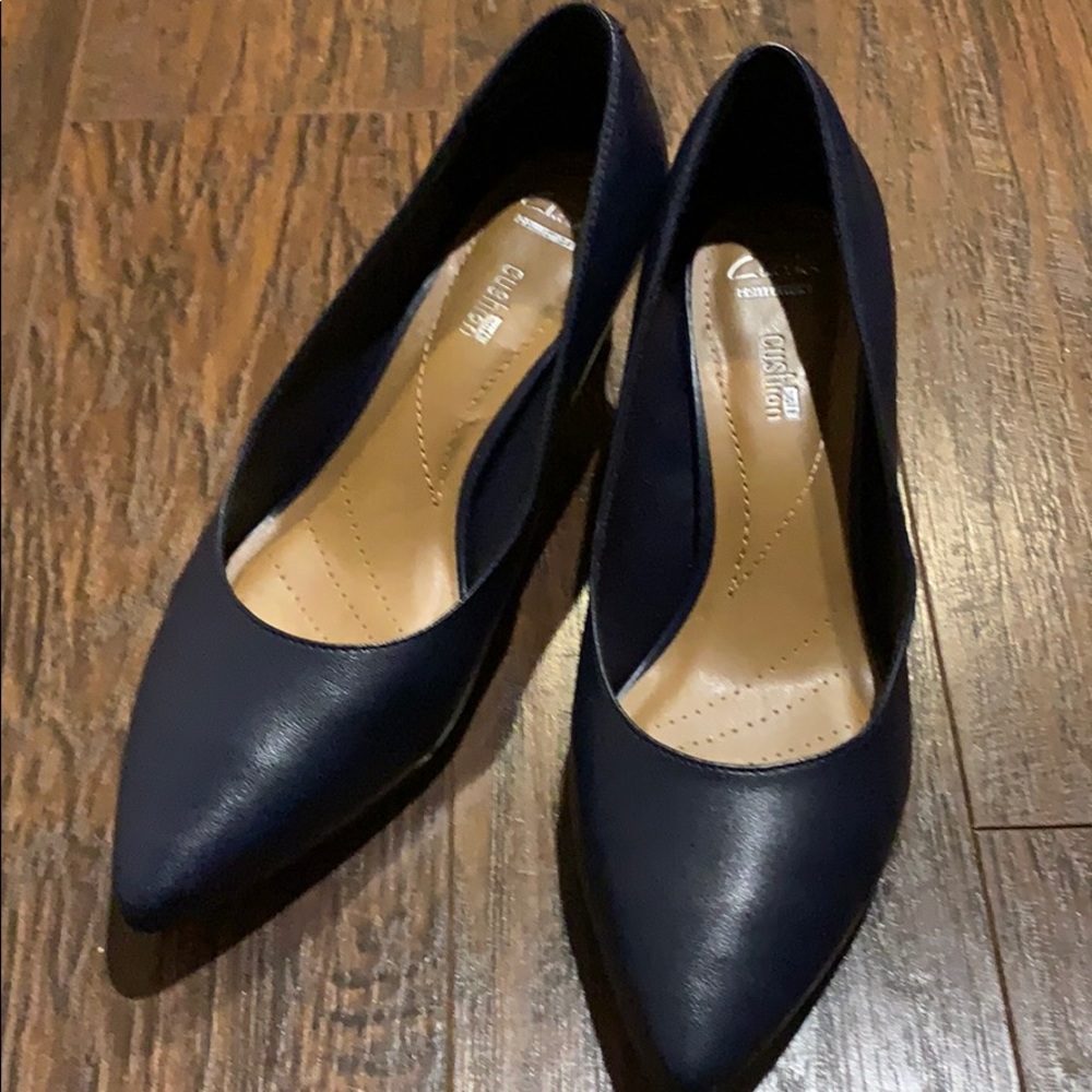 Clark’s navy leather heals